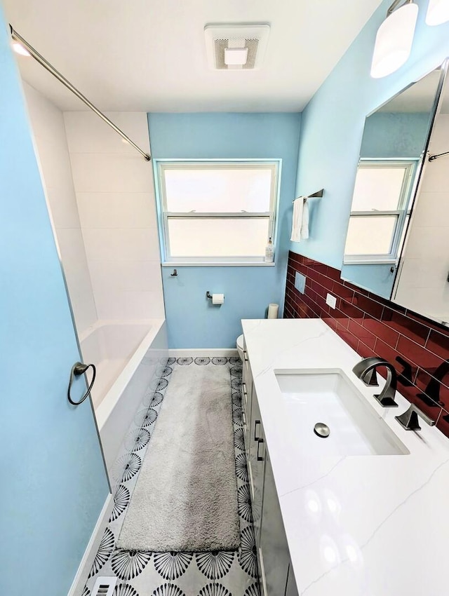 8049 Country Club Ln, North Riverside, IL 60546 - bathroom with vanity, backsplash, and shower / tub combination