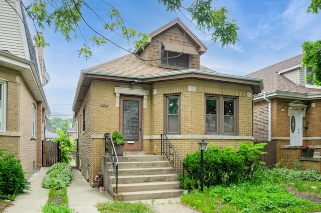 2931 N Lowell Ave, Chicago, IL 60641 - view of front of house with brick siding and roof with shingles