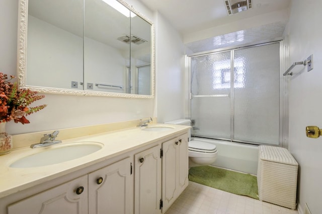 2931 N Lowell Ave, Chicago, IL 60641 - full bath featuring double vanity, combined bath / shower with glass door, and tile patterned floors
