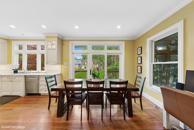 1419 Judson Ave, Evanston, IL 60201 - dining space with wood finished floors, crown molding, and recessed lighting