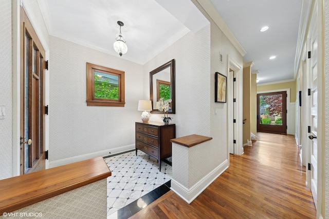 1419 Judson Ave, Evanston, IL 60201 - foyer entrance featuring ornamental molding, wood finished floors, and wallpapered walls