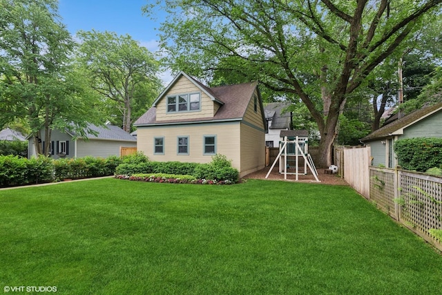 1419 Judson Ave, Evanston, IL 60201 - view of front of property featuring a playground and roof with shingles
