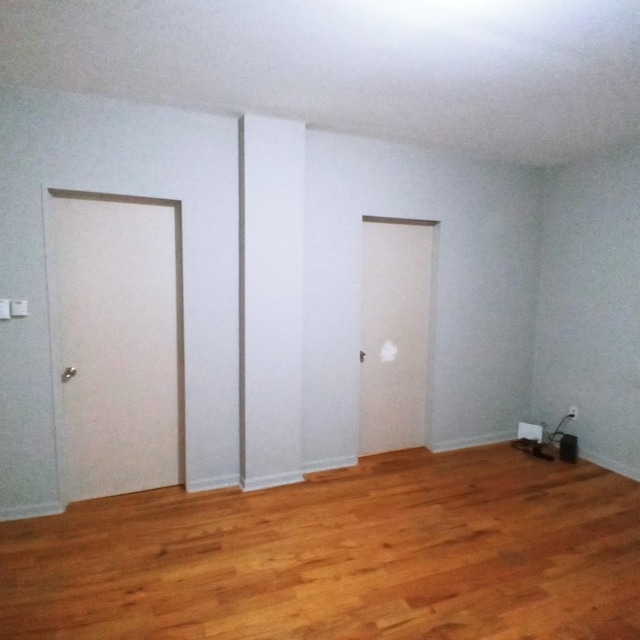 5443 S Long Ave, Chicago, IL 60638 - unfurnished room with light wood-style floors
