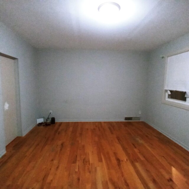 5443 S Long Ave, Chicago, IL 60638 - empty room with wood finished floors