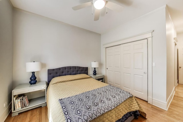 5502 S Hyde Park Blvd Unit 2, Chicago, IL 60637 - bedroom featuring light wood-style flooring, a closet, and ceiling fan