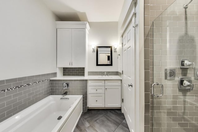 5502 S Hyde Park Blvd Unit 2, Chicago, IL 60637 - full bathroom featuring a bath, vanity, and a stall shower