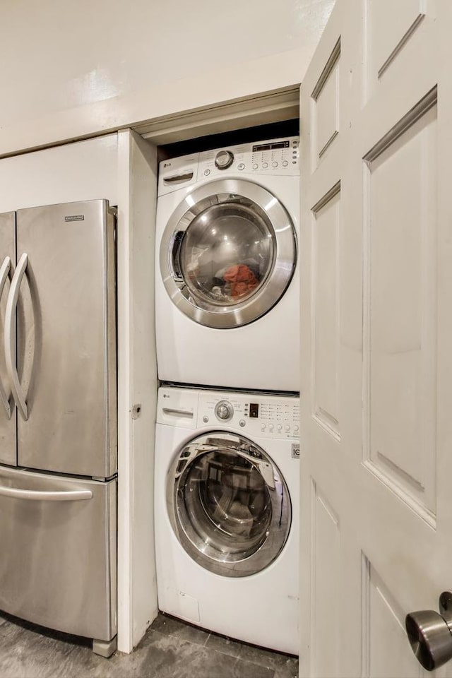 5502 S Hyde Park Blvd Unit 2, Chicago, IL 60637 - washroom with stacked washer and clothes dryer