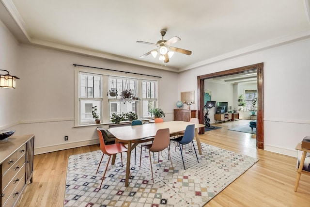 5502 S Hyde Park Blvd Unit 2, Chicago, IL 60637 - dining room featuring healthy amount of natural light, light wood-type flooring, ceiling fan, and ornamental molding
