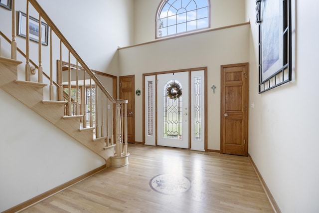 3412 Sunnyside Ct, Naperville, IL 60564 - foyer entrance with wood finished floors, stairway, and a towering ceiling