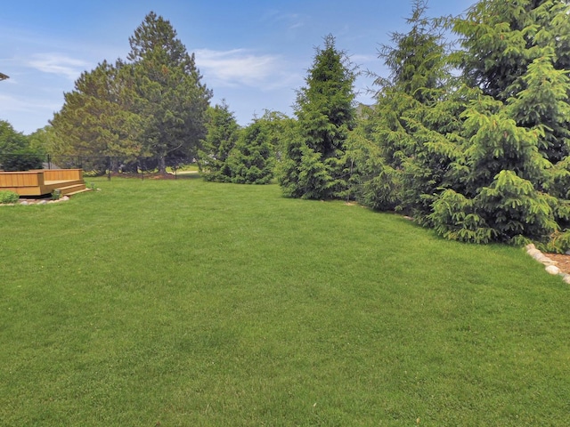1637 Old Field Ct, Rockton, IL 61072 - view of green lawn with a wooden deck