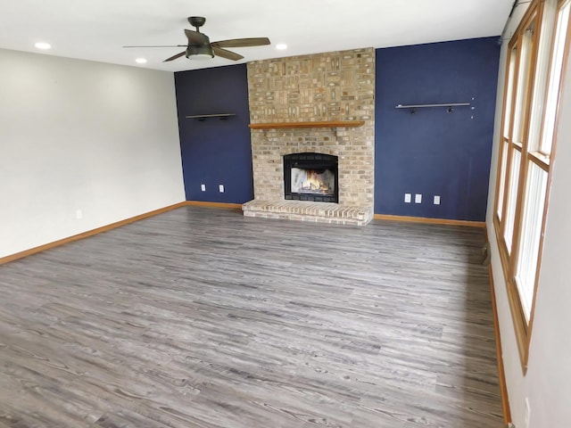 1637 Old Field Ct, Rockton, IL 61072 - unfurnished living room featuring wood finished floors, a ceiling fan, a fireplace, and recessed lighting