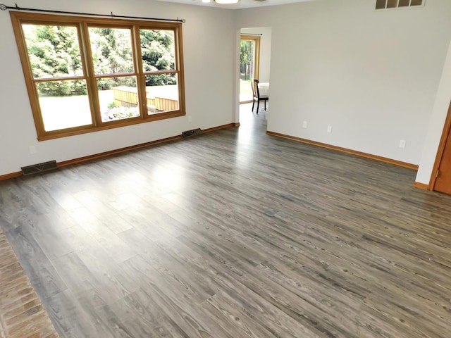 1637 Old Field Ct, Rockton, IL 61072 - spare room with baseboards and wood finished floors
