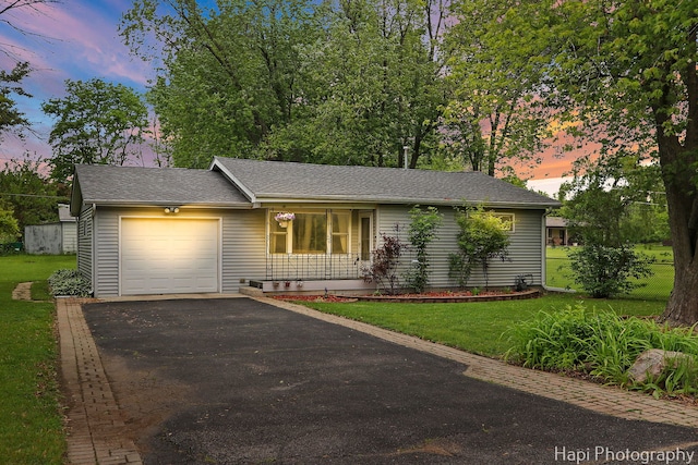 12112 W Bonnie Brook Ln, Beach Park, IL 60087 - ranch-style home with an attached garage, driveway, a porch, and roof with shingles