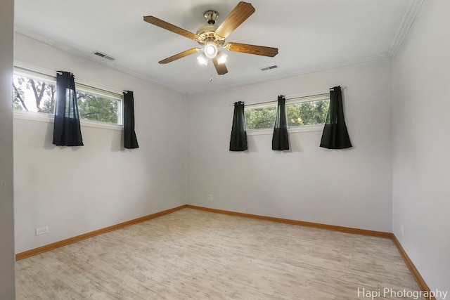 12112 W Bonnie Brook Ln, Beach Park, IL 60087 - unfurnished room featuring light wood-type flooring, ornamental molding, and ceiling fan