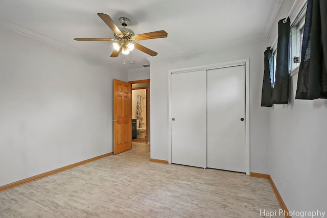 12112 W Bonnie Brook Ln, Beach Park, IL 60087 - unfurnished bedroom with light wood-style floors, a closet, ornamental molding, and a ceiling fan