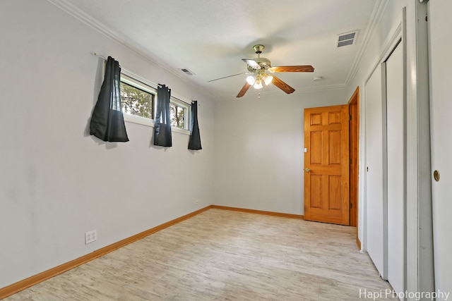 12112 W Bonnie Brook Ln, Beach Park, IL 60087 - spare room with light wood-type flooring, ceiling fan, and crown molding