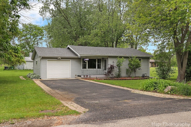 12112 W Bonnie Brook Ln, Beach Park, IL 60087 - single story home featuring an attached garage, driveway, a front yard, and roof with shingles
