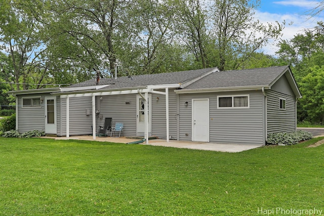 12112 W Bonnie Brook Ln, Beach Park, IL 60087 - back of house featuring a patio, a lawn, and a shingled roof