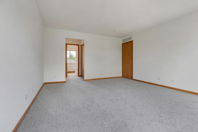 838 Valley Stream Dr, Pingree Grove, IL 60140 - spare room with baseboards and light colored carpet