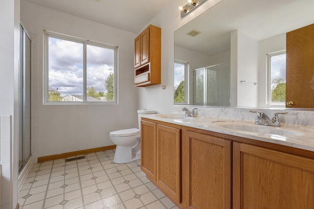 838 Valley Stream Dr, Pingree Grove, IL 60140 - full bathroom with healthy amount of natural light, double vanity, an enclosed shower, and tile patterned floors