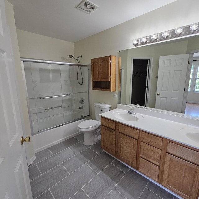 4029 Boulder Ct, Aurora, IL 60504 - bathroom with double vanity and bath / shower combo with glass door