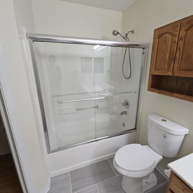 4029 Boulder Ct, Aurora, IL 60504 - bathroom featuring vanity, shower / bath combination with glass door, and tile patterned floors