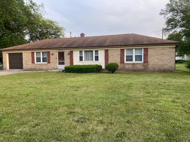 1415 Lakewood Dr, Mendota, IL 61342 - single story home with brick siding, a garage, a front yard, and a chimney