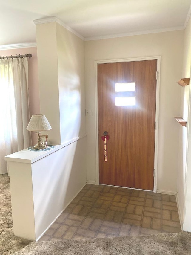 1415 Lakewood Dr, Mendota, IL 61342 - entryway featuring brick patterned flooring and crown molding