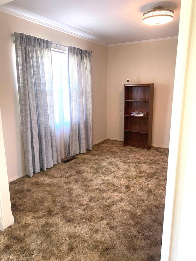 1415 Lakewood Dr, Mendota, IL 61342 - empty room featuring crown molding and carpet