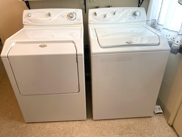1415 Lakewood Dr, Mendota, IL 61342 - washroom featuring washing machine and clothes dryer