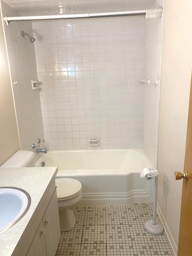 1415 Lakewood Dr, Mendota, IL 61342 - full bathroom featuring vanity, tile patterned floors, and  shower combination