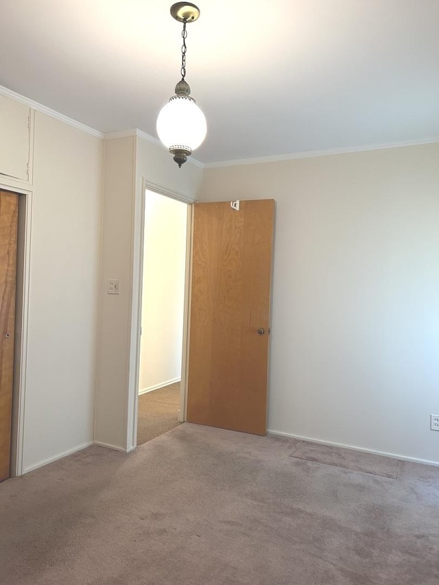 1415 Lakewood Dr, Mendota, IL 61342 - unfurnished room with carpet flooring and ornamental molding