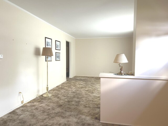1415 Lakewood Dr, Mendota, IL 61342 - corridor with carpet and crown molding
