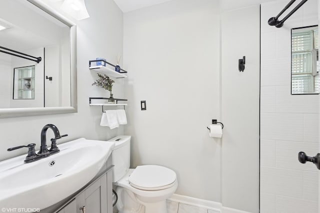 220 E Elm St, Wheaton, IL 60189 - full bathroom with vanity, a tile shower, and tile patterned floors