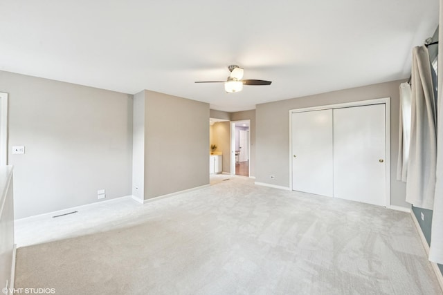 220 E Elm St, Wheaton, IL 60189 - unfurnished bedroom featuring carpet floors, a closet, and ceiling fan