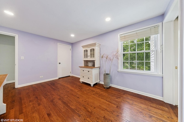 220 E Elm St, Wheaton, IL 60189 - unfurnished bedroom featuring dark wood-type flooring and recessed lighting