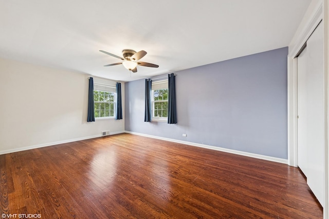 220 E Elm St, Wheaton, IL 60189 - unfurnished bedroom with wood finished floors, a closet, and a ceiling fan