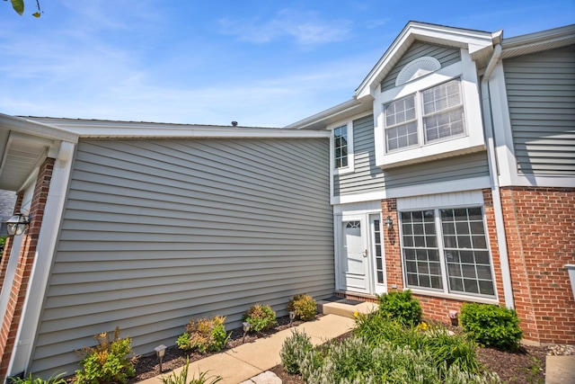 257 Eclipse Dr Unit 257, Carol Stream, IL 60188 - view of front of home with brick siding