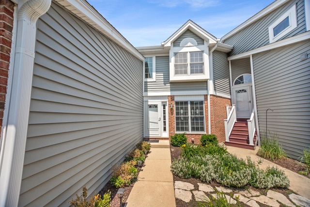 257 Eclipse Dr Unit 257, Carol Stream, IL 60188 - view of exterior entry featuring brick siding