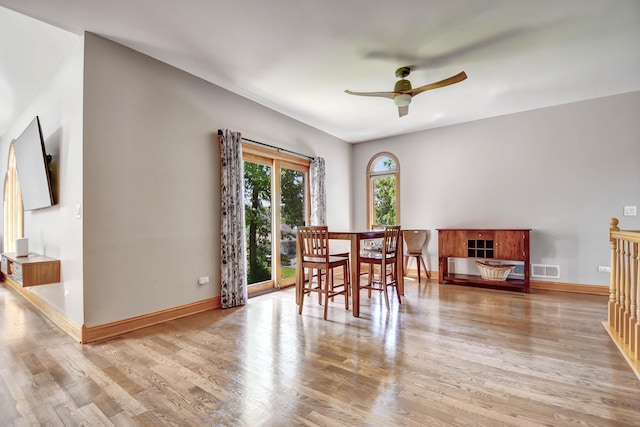 1383 Gordon Ln, Lemont, IL 60439 - dining area with light wood finished floors and ceiling fan