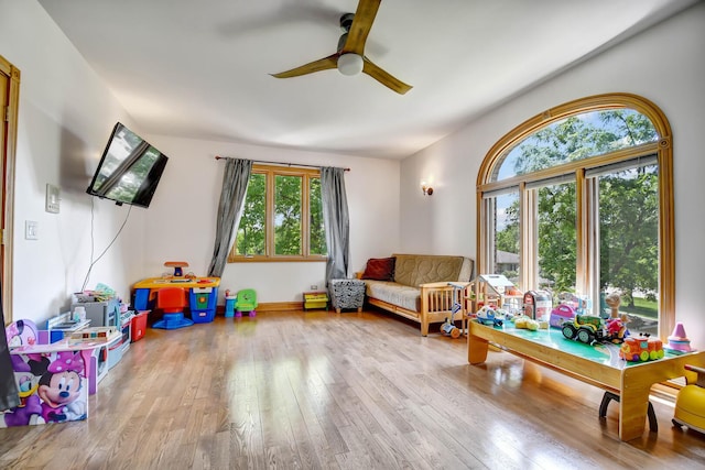 1383 Gordon Ln, Lemont, IL 60439 - playroom featuring healthy amount of natural light, a ceiling fan, and hardwood / wood-style floors