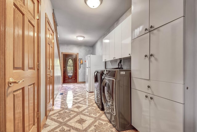 1383 Gordon Ln, Lemont, IL 60439 - laundry room with cabinet space, washing machine and clothes dryer, and light tile patterned flooring