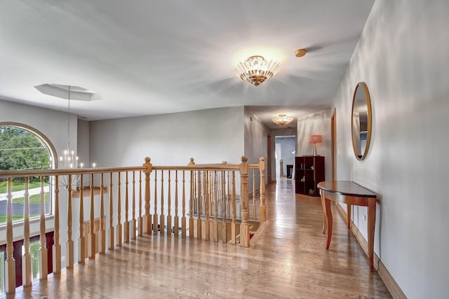 1383 Gordon Ln, Lemont, IL 60439 - hall with a chandelier, an upstairs landing, and wood finished floors