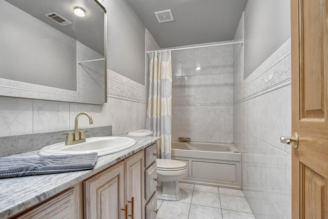 1383 Gordon Ln, Lemont, IL 60439 - full bathroom with vanity, tile walls, tile patterned flooring, and shower / bath combo