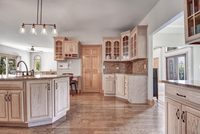 1383 Gordon Ln, Lemont, IL 60439 - kitchen featuring wood finished floors, glass insert cabinets, and light brown cabinetry