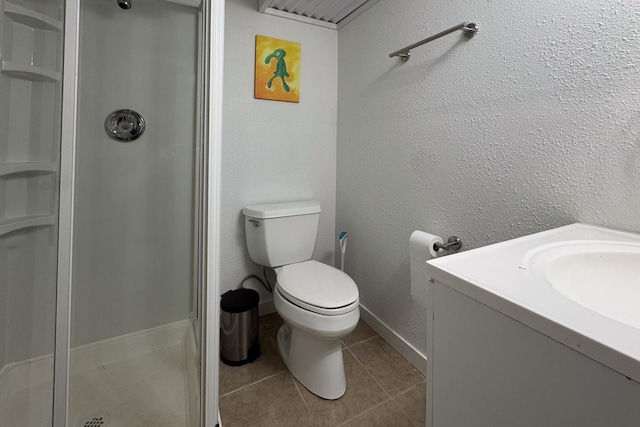 14194 Kennedy Dr, South Beloit, IL 61080 - full bathroom featuring a stall shower, tile patterned flooring, and vanity