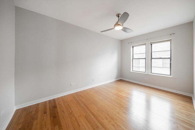 6829 N Lakewood Ave Unit 3, Chicago, IL 60626 - unfurnished room with light wood-style floors and a ceiling fan