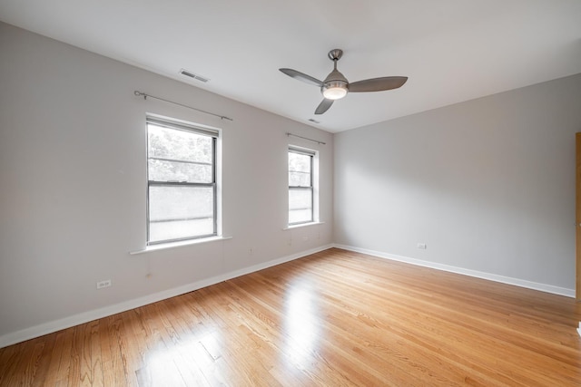 6829 N Lakewood Ave Unit 3, Chicago, IL 60626 - empty room featuring a ceiling fan and light wood-style floors