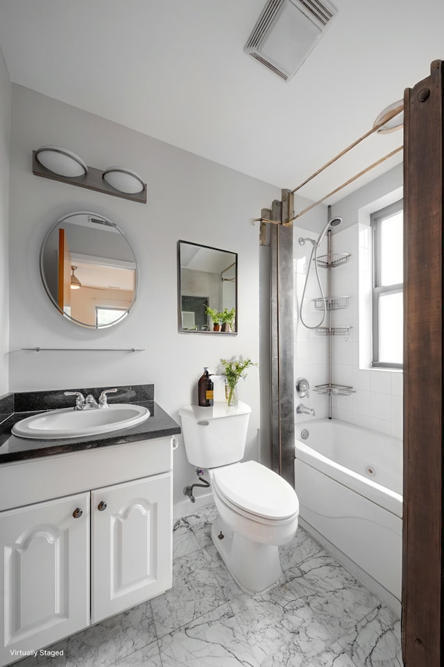 6829 N Lakewood Ave Unit 3, Chicago, IL 60626 - full bath with marble look tile flooring, vanity, and shower / bath combination