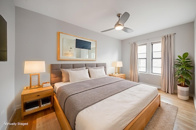 6829 N Lakewood Ave Unit 3, Chicago, IL 60626 - bedroom featuring light wood finished floors and ceiling fan